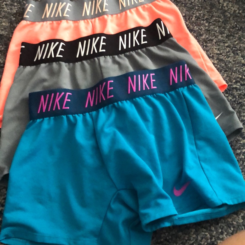3 size M Nike shorts can fit size L